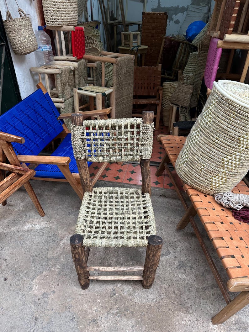 Handcrafted Laurel Wood Dining Chair with Woven Palm Leaf Seat & Backrest AZRIVA
